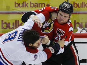 Ottawa Senators Chris Neil and Montreal Canadiens Brandon Prust fight during NHL hockey action at Scotiabank Place in Ottawa on Wednesday January 30,2013. Errol McGihon/Ottawa Sun/QMI Agency