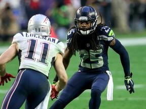 Richard Sherman of the Seattle Seahawks faces Julian Edelman of the New England Patriots during Super Bowl XLIX at University of Phoenix Stadium February 1, 2015 in Glendale, Ariz. (Stephen Dunn/Getty Images/AFP)