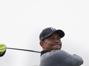 Tiger Woods tees off on the fourth hole of the North Course during the Farmers Insurance Open Pro Am at Torrey Pines Golf Course on February 4, 2015. (Todd Warshaw/Getty Images/AFP)