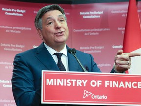 Ontario Finance Minister Charles Sousa at a press conference during his pre-budget consultation on Friday, Jan. 23, 2015 in Toronto. (Veronica Henri/Toronto Sun)