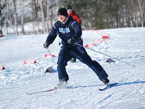 St. Benedict Bears' Andrew Rocha takes part in the team relay race during the Nordic City Championships at Walden Trails on Thursday.