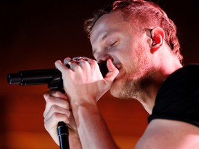 Imagine Dragons lead singer Dan Reynolds performs during their half-time set at the Grey Cup in Vancouver. (IAN KUCERAK/Edmonton Sun)