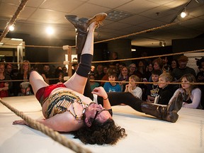 Terrance Houle, as Blackfooter, battles an opponent in a National Indian Leg Wrestling League of North America event. The exhibit runs through March 14 at Urban Shaman Contemporary Aboriginal Art Gallery in Winnipeg, Man., with a three-bout match on opening night this Friday.
