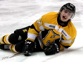 Kingston Frontenacs forward Sam Bennett moans in pain after being hit during a game against the Oshawa Generals at the K-Rock Centre in Kingston on March 8 2013. (IAN MACALPINE/Kingston Whig-Standard/QMI Agency)