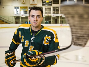 University of Alberta Golden Bears hockey captain Kruise Reddick poses for a photo at Clare Drake Arena in Edmonton, Alta., on Thursday, Oct. 2, 2014. Codie McLachlan/Edmonton Sun