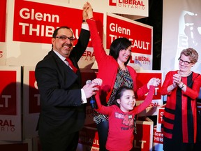 Sudbury MPP-elect Glenn Thibeault celebrates his election victory with wife, Yolanda, daughter, Thea, and Ontario Premier Kathleen Wynne at a party for Thibeault in Sudbury on Thursday night. JOHN LAPPA/THE SUDBURY STAR/QMI AGENCY