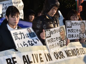 People stage a silent rally for Japanese hostage Kenji Goto called