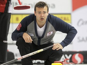 Skip Evan Martin calls in a rock during Safeway Select curling in Brandon, Man. Wednesday Feb. 4, 2015.