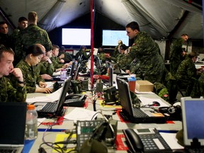 Soldiers at work in a communications command post during Exercise SENECA RAM on Tuesday, February 3, 2015  in Edmonton, AB. (TREVOR ROBB/EDMONTON SUN)