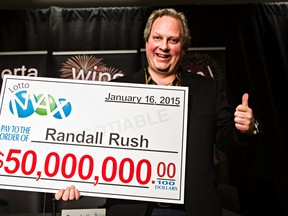 Lotto Max jackpot winner Randall Rush poses for the media at the Alberta Gaming and Liquor Commission in St. Albert, Alta., Feb. 6, 2015. (CODIE McLACHLAN/QMI Agency)
