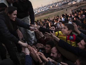 United Nations High Commissioner for Refugees (UNHCR) Special Envoy Angelina Jolie meets members of the Yazidi minority in Khanke internally displaced person (IDP) Camp in Dohuk, northern Iraq January 25, 2015. Jolie paid a visit to the Kurdish refugee camp in Dohuk, northern Iraq on Sunday and said the international community should