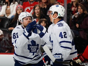 Tyler Bozak celebrates his powerplay goal at 11:51 of the third period against the New Jersey Devils along with Phil Kessel at the Prudential Center on Feb. 6, 2015 in Newark. The Devils defeated the Maple Leafs 4-1.  (Bruce Bennett/Getty Images/AFP)