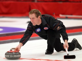 Karrick Martin tries out the ice surface at the Leduc Recreation Centre.  Teams practice on the first day of the Alberta Men's Curling Championships in Leduc, Alberta on Feb 5, 2013.  Perry Mah/Edmonton Sun  QMI Agency