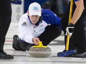 Mat Comm of Team Kean releases his rock during their match against Team Epping at the Recharge with Milk Tankard in Dorchester last night. With the 8-3 win, Team Epping advances directly to Sunday’s final. (Craig Glover/QMI Agency)
