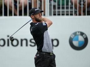 Graham DeLaet tees off from the 18th hole during the second round of the BMW Championship at Cherry Hills Country Club Sep 5, 2014. (Ron Chenoy-USA TODAY Sports)