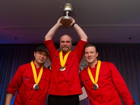 Local chef Ryan O’Flynn, middle, of the Westin Edmonton wins gold at the Canadian Culinary Championships on February 7, 2015 in Kelowna, B.C. beating out 11 of Canada's best chefs in the competition. PHOTO SUPPLIED/Yuri Akuney