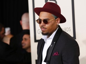 Singer Chris Brown arrives at the 57th annual Grammy Awards in Los Angeles, California February 8, 2015.   REUTERS/Mario Anzuoni