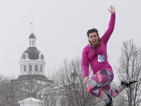 Whig reporter Steph Crosier jumps into Lake Ontario in the polar plunge Plunge during FebFest on Sunday. (Julia McKay/The Whig-Standard)