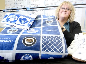 Theresa McMurray, executive director of Stratford House of Blessing, shows some of the autographed items from Justin Bieber's childhood that will be auctioned on eBay, with all proceeds supporting the House of Blessing.

Scott Wishart/QMI Agency