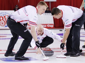 Skip Kevin Koe delivered another Alberta championship title with the help of sweepers Marc Kennedy, left, and Ben Hebert (Zac McLachlan, Special to the Edmonton Sun).