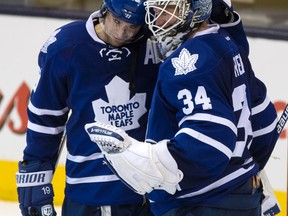 Joffrey Lupul and goalie James Reimer celebrate the Maple Leafs' 5-1 victory over the Edmonton Oilers on Saturday night at the ACC. (Craig Robertson/Toronto Sun)