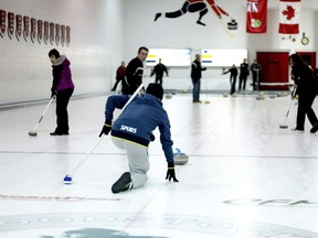 Peter Pedryc throws the rock during the first annual Rock the Fund Bonspiel at the Woodstock Curling Club on Saturday. (BRUCE CHESSELL/Sentinel-Review)​
