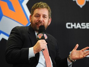 James Dolan, Executive Chairman of Madison Square Garden, answers questions during the press conference to introduce Phil Jackson as President of the New York Knicks at Madison Square Garden on March 18, 2014 in New York City. (Maddie Meyer/Getty Images/AFP)