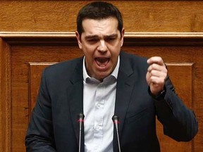 Greek Prime Minister Alexis Tsipras delivers his first major speech in parliament in Athens February 8, 2015.  REUTERS/ Alkis Konstantinidis