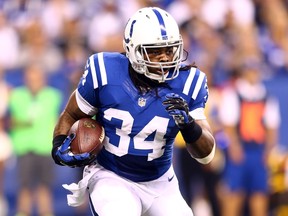 Running back Trent Richardson #34 of the Indianapolis Colts carries the ball against the Philadelphia Eagles during a game at Lucas Oil Stadium on September 15, 2014. (Andy Lyons/Getty Images/AFP)