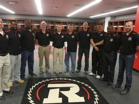 The 2015 Ottawa RedBlacks coaching staff was introduced at TD Place Monday. From left, defensive assistant Derek Oswalt, defensive backs coach Ike Charlton, defensive line coach Leroy Blugh, defensive coordinator Mark Nelson, head coach Rick Campbell, special teams coordinator Don Yanowsky, offensive coordinator and quarterbacks coach Jason Maas, offensive line coach Bryan Chiu, receivers coach Travis Moore and running backs coach Jordan Maksymic.​ (Chris Hofley/Ottawa Sun)