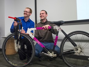 Michael Mclaren and James Nugent with their 3D printed bicycle. This is the fourth prototype model of the bike and they will be working on the fifth by summertime. 
DANI-ELLE DUBE/Ottawa Sun/QMI AGENCY