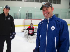 Jason Van Spronsen works with Steve McKichan at his goalie school, Future Pro Goalie, which will welcome more than 700 young goalies during its six-week summer program at Western Fair Sportsplex. (MIKE HENSEN, The London Free Press)