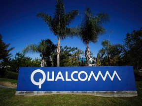 A Qualcomm sign is pictured in front of one of its many buildings in San Diego, California, in this November 5, 2014 file photo. Qualcomm Inc is likely to pay China a record fine of around $1 billion (0.66 billion pounds), ending a 14-month government investigation into anti-competitive practices, after the U.S. chipmaker and the regulator made significant progress during talks last week.
REUTERS/Mike Blake/Files
