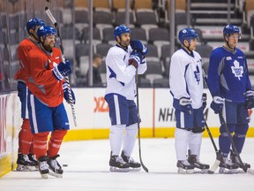 Daniel Winnik (centre), a pending unrestricted free agent, is among those players who is unlikely to be a Maple Leaf past the March 2 trade deadline. (Ernest Doroszuk/Toronto Sun)