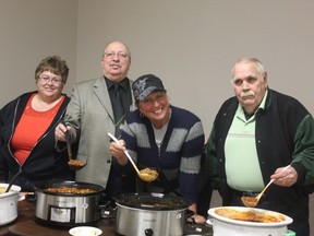 The Lambton 4-H Association held its semi-annual Chili Cook-Off Jan. 30 at the Plympton-Wyoming Building. From left is 4-H leader Lisa McEwen with Sarnia-Lambton MPP Bob Bailey, CHOK talk show host Sue Storr, and Plympton-Wyoming mayor Lonnie Napper, who judged the chili entries.