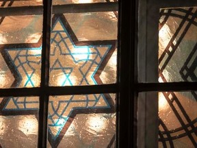 A window is pictured with the Star of David of the new synagogue a former church "Schlosskirche", meaning castle church, in Cottbus, Germany, January 27, 2015.    REUTERS/Hannibal Hanschke