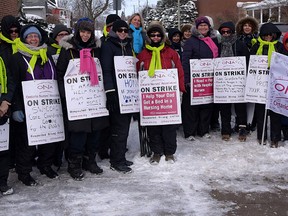 Members of the Oxford Care Coordinators, part of the South West Region CCAC, were standing in solidarity with eight other CCAC (Community Care Access Centres) Tuesday morning in Tillsonburg. The care coordinators are dividing their time between Tillsonburg, Woodstock and Ingersoll. (CHRIS ABBOTT/TILLSONBURG NEWS)
