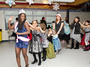 Dancers congo during the  Cochrane Great Whites Frozen Fairytale Ball held at the Tim Horton Events on Saturday.