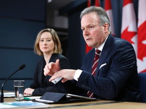 Bank of Canada Governor Stephen Poloz (R) speaks during a news conference with Senior Deputy Governor Carolyn Wilkins upon the release of the Monetary Policy Report in Ottawa January 21, 2015. REUTERS/Chris Wattie