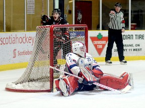 Soo Thunderbirds captain Anthony Miller points to a teammate (out of the frame) after stuffing a shot behind Cochrane Crunch goalie Brett Young during the first period of Saturday night’s NOJHL game at the Tim Horton Event Centre in Cochrane.