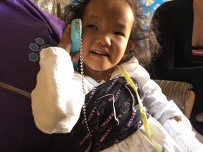 Michael and Johanne Wagner's daughter Phuoc, 3, seen here in a photo her mother posted to Facebook, went into surgery Tuesday afternoon to receive a portion of her father's liver.