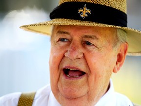 New Orleans Saints team owner Tom Benson looks on as his team participates in a NFL training camp in Metairie, Louisiana July 26, 2013. (REUTERS/Sean Gardner)