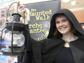 Morgan Anderson, one of the guides for The Haunted Walk, was on hand with almost 100 other local businesses and organizations who set up booths in the Queen's University athletics centre Tuesday for a career fair that let graduating students know what jobs are available locally. (Michael Lea/The Whig-Standard)