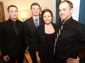 Brianna Workman received a lifesaving award at Government House in Winnipeg, Man. Tuesday February 10, 2015 after ahe and Colton Spraggs (l) and Tyler Curle saved her boyfriend Dennis Zboril (r) from drowning on Lake Minnedosa. (Brian Donogh/Winnipeg Sun/QMI Agency)