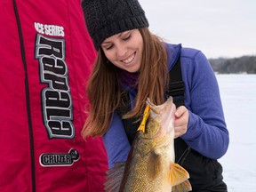Ashley Rae holds a muskie she caught while ice fishing on the Bay of Quinte. (Supplied photo)