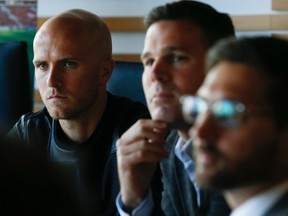 From left: New TFC captain Michael Bradley,  coach Greg Vanney and GM Tim Bezbatchenko talk to the Toronto Sun at a candid meeting on Tuesday at the Air Canada Centre. (Stan Behal/Toronto Sun)