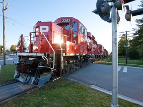 A Canadian Pacific train crosses John St. in the village of Pontypool southwest of Peterborough on Tuesday, Sept. 16, 2014. JASON BAIN/QMI Agency