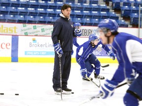 Sudbury Wolves head coach Dave Matsos keeps a close eye on his charges during team practice at the Sudbury Community Arena on Tuesday afternoon. The Wolves host the North Bay Battalion tonight, game time is 7 p.m. Gino Donato/The Sudbury Star