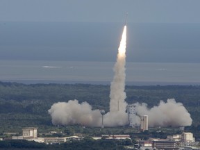This handout photo made available by the ESA on February 11, 2015 shows a Vega rocket lifting off from the ESA's base in Kourou, French Guiana, bearing the Intermediate eXperimental Vehicle (IXV) on a 100-minute test mission. The European Space Agency (ESA) said it had launched a prototype craft designed to return to Earth at the end of its mission, a key goal in space strategy. The sub-orbital mission will test technologies that ESA hopes will lead to a reusable spacecraft.
RESTRICTED TO EDITORIAL USE- MANDATORY CREDIT "AFP PHOTO / ESA/ STEPHANE CORVAJA
