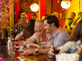 Amy Schumer and Bill Hader in a scene from Trainwreck.